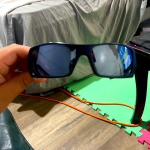 Black Oakley gas cans